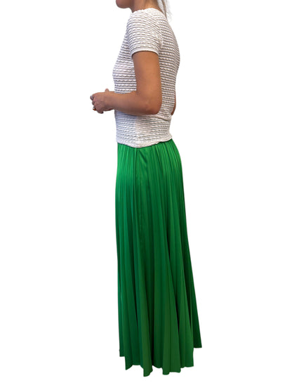 Brandsamsara P.A.R.O.S.H. long green pleated skirt paired with a white textured short-sleeve top