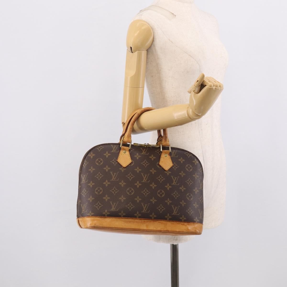 Louis Vuitton Vintage Alma Monogram Canvas, Brown, Canvas, Handbag