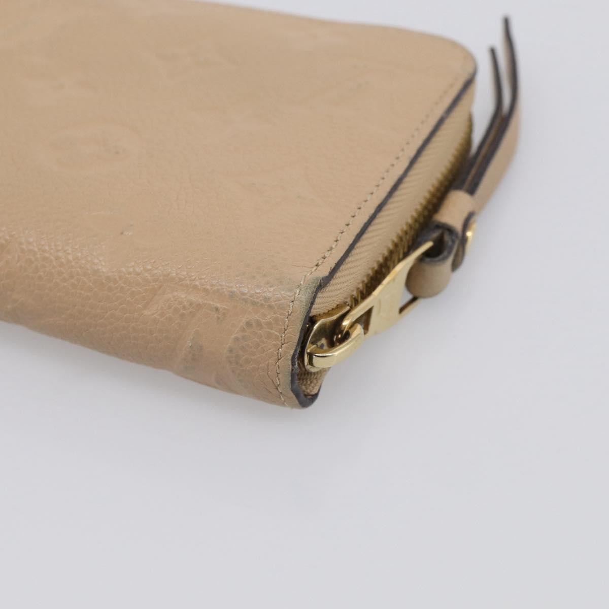Louis Vuitton Zippy Monogram Empreinte Leather, Beige, Leather, Wallet