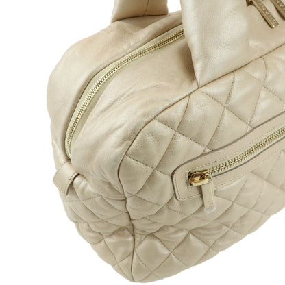 Chanel Coco Cocoon Bowling Quilted Lambskin, Gold, Leather, Handbag