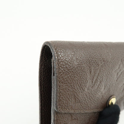 Louis Vuitton Curieuse Monogram Empreinte Leather, Brown, Leather, Wallet
