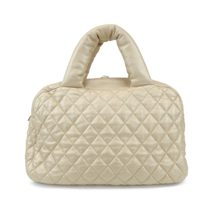 Chanel Coco Cocoon Bowling Quilted Lambskin, Gold, Leather, Handbag