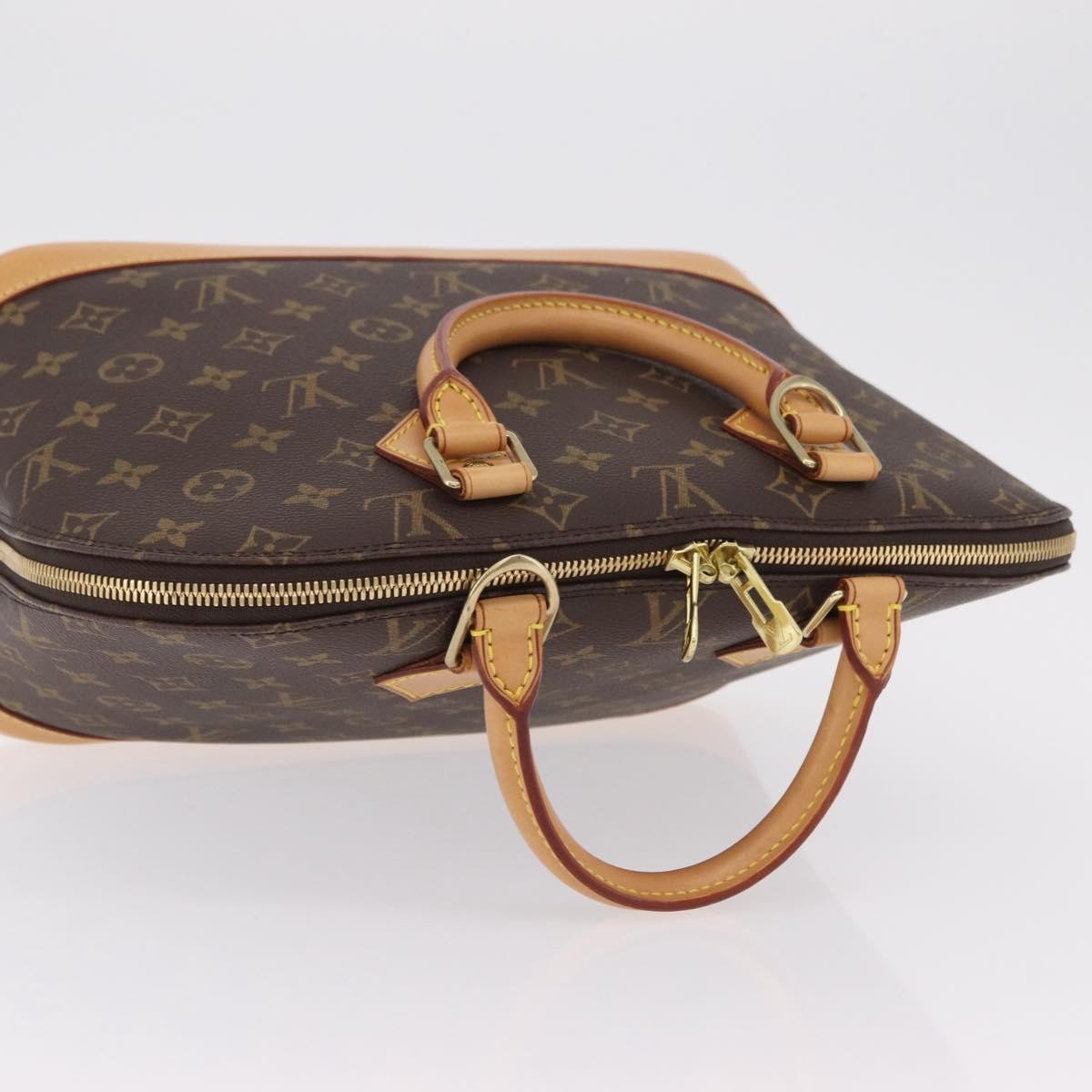 Louis Vuitton Alma Monogram Canvas, Brown, Canvas, Handbag
