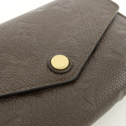 Louis Vuitton Curieuse Monogram Empreinte Leather, Brown, Leather, Wallet