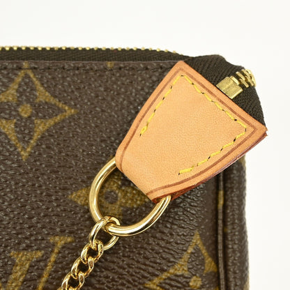 Louis Vuitton Mini pochette accessoires Canvas, Brown, Canvas, Clutch