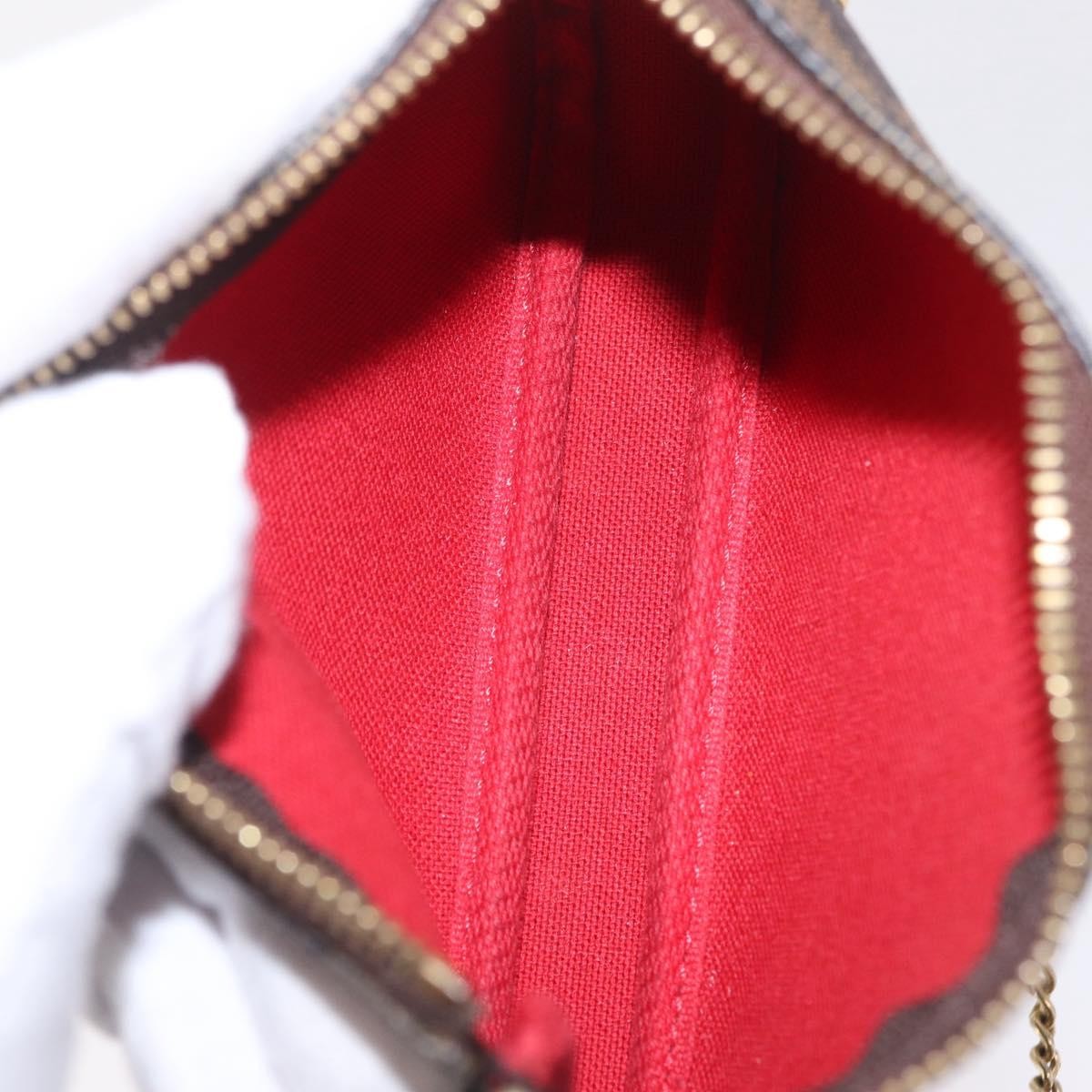 Louis Vuitton Mini pochette accessoires Damier Canvas, Brown, Canvas, Clutch