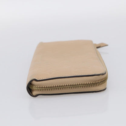 Louis Vuitton Zippy Monogram Empreinte Leather, Beige, Leather, Wallet