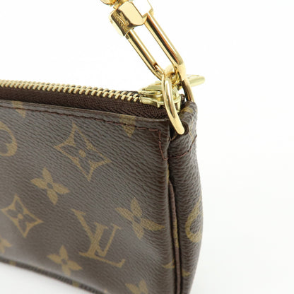 Louis Vuitton Pochette Accessoires Limited Edition Monogram Canvas, Brown, Canvas, Clutch