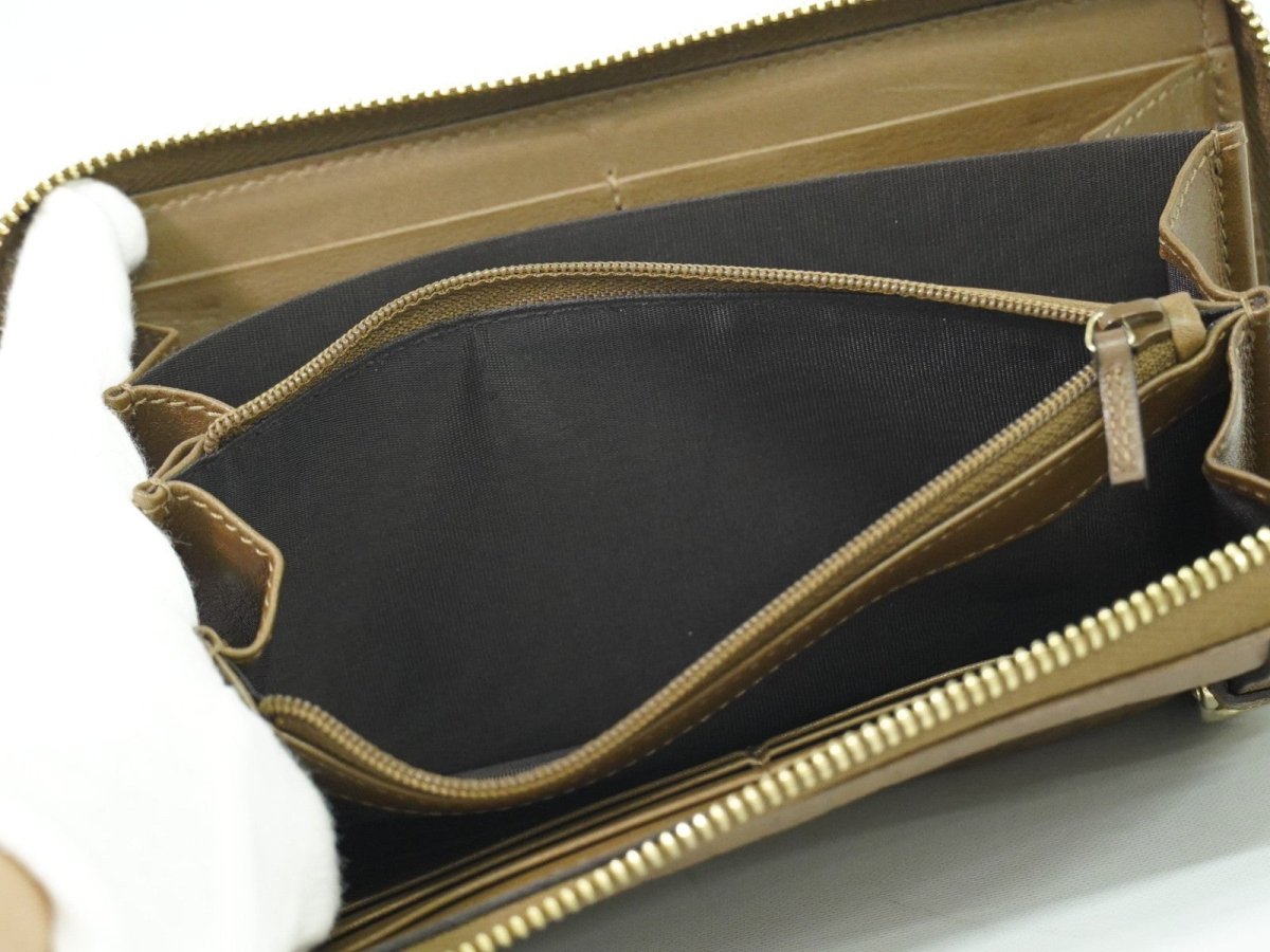 Gucci Guccissima Wallet - Brandsamsara