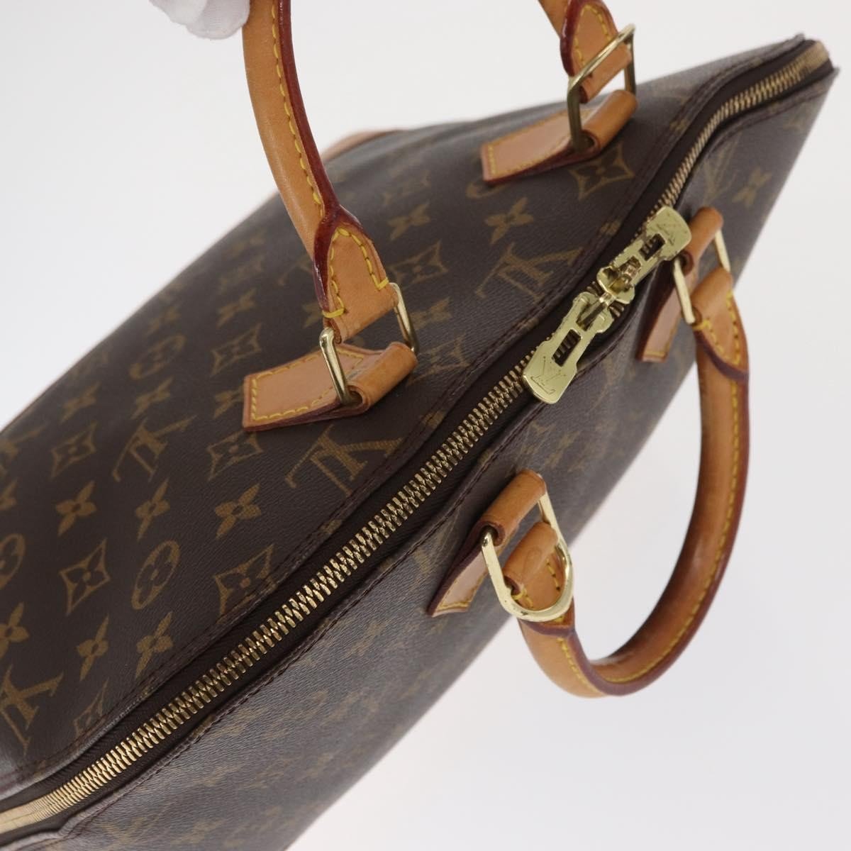 Louis Vuitton Alma Handbag - Brandsamsara