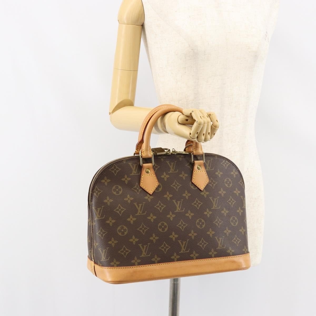Louis Vuitton Alma Handbag - Brandsamsara
