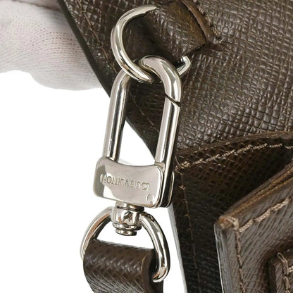 Louis Vuitton Belaia Clutch - Brandsamsara