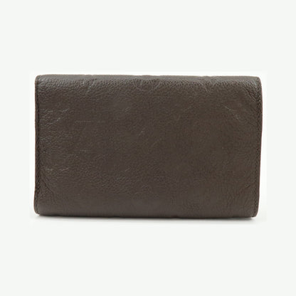 Louis Vuitton Curieuse Monogram Empreinte Leather, Brown, Leather, Wallet