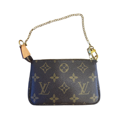 Brandsamsara Louis Vuitton Monogram Mini Pochette handbag in brown leather with a gold chain strap.