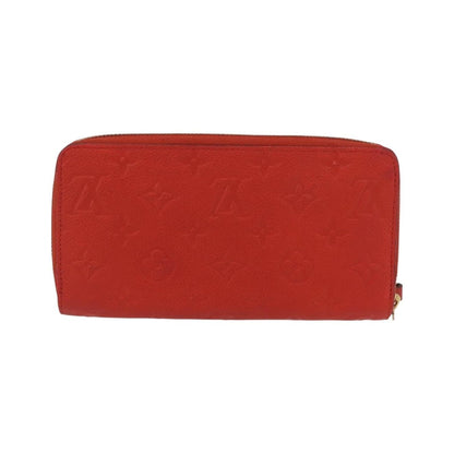 Louis Vuitton Portefeuille zippy Monogramme Empreinte Monogramme Empreinte, Orange, Leather, Wallet