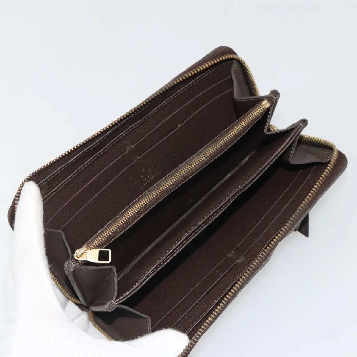 Louis Vuitton Zippy Wallet NM - Brandsamsara