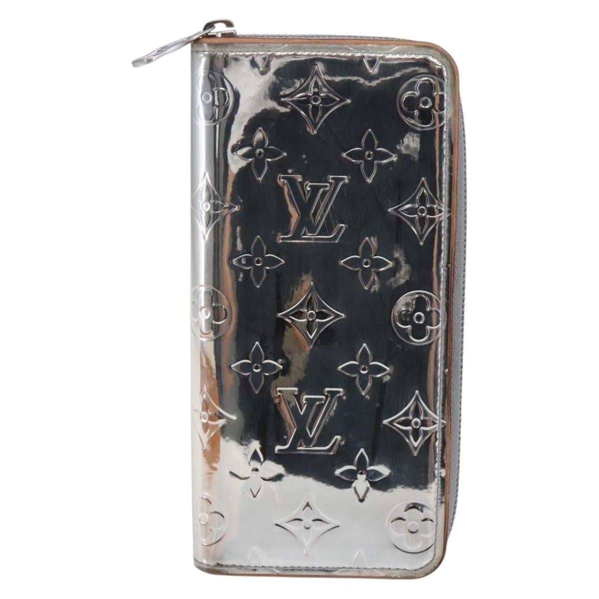 Louis Vuitton Zippy wallet vertical - Brandsamsara