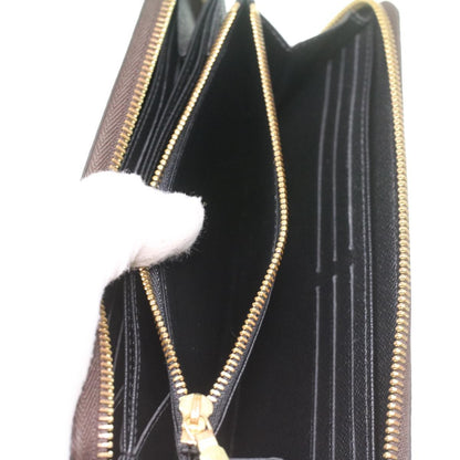 Louis Vuitton Zippy Wallet NM Monogram Giant Reverse, Brown, Canvas, Wallet