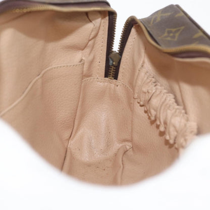 Louis Vuitton Trousse Toilette Monogram Canvas, Brown, Canvas, Clutch