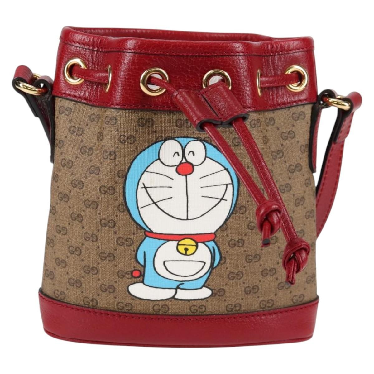 Gucci Doraemon Bucket Bag Printed Mini GG Coated Canvas, BEIGE, PVC, Crossbody bag