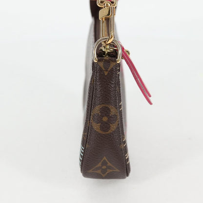 Louis Vuitton Pochette Accessoires Limited Edition Christmas Animation Monogram Canvas, BROWN, CANVAS, Clutche & pouche