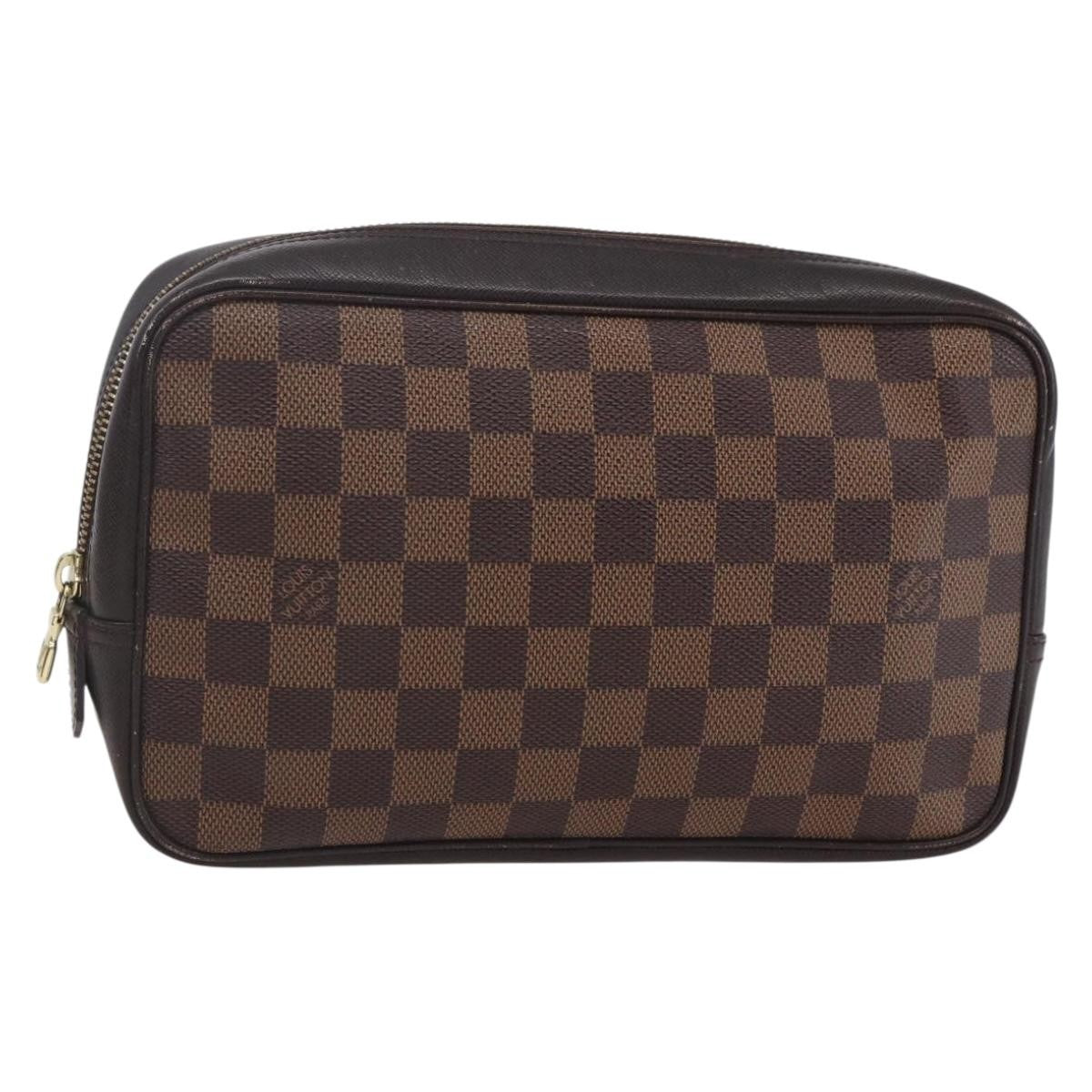 Louis Vuitton Trousse Toilette Monogram Canvas, BROWN, CANVAS, Clutche & pouche