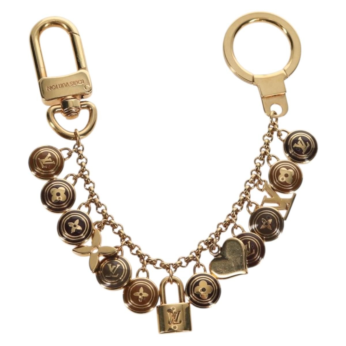 Louis Vuitton Pastilles Bag Charm and Key Holder Metal and Enamel, GOLD, METAL, Charms and Keychains