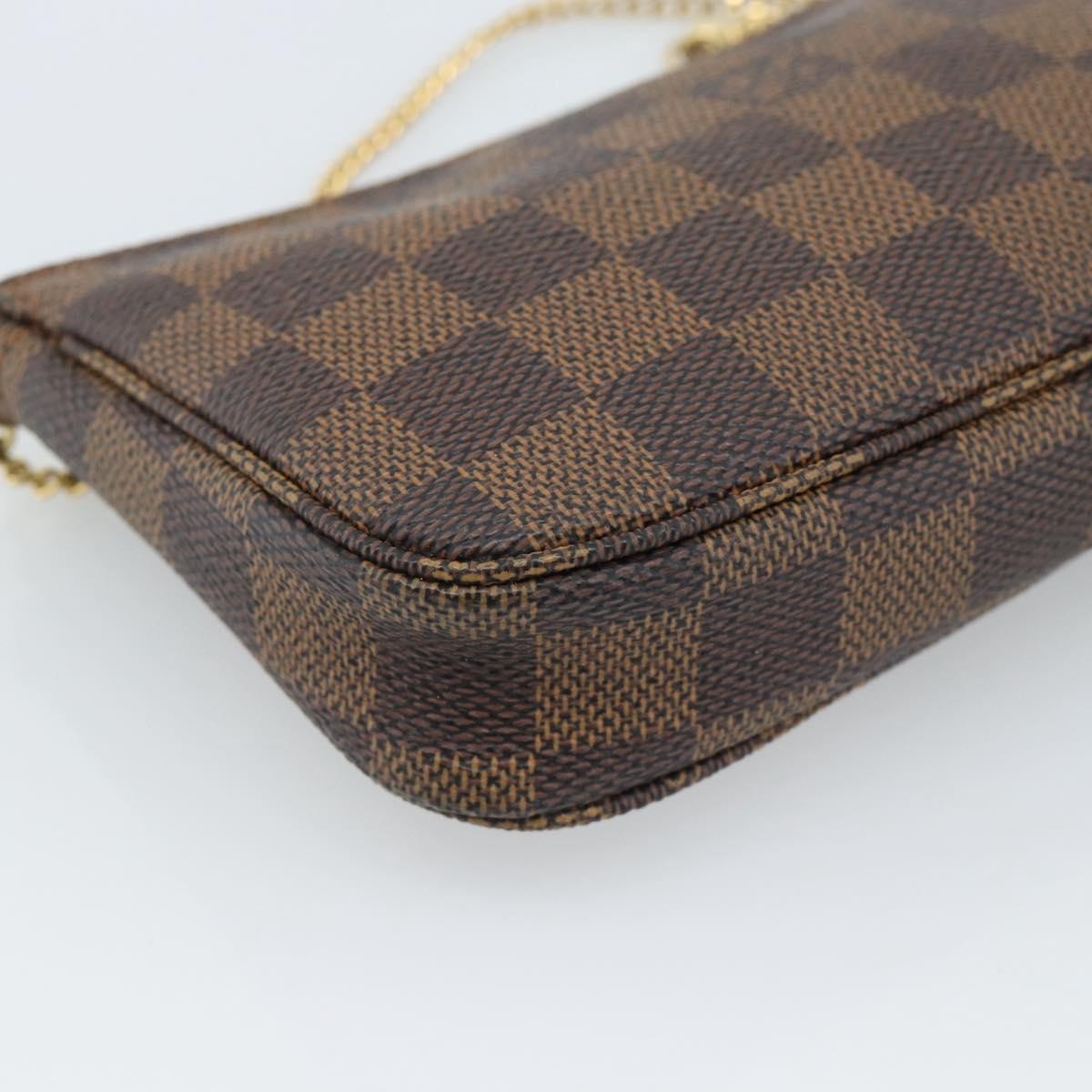 Louis Vuitton Mini pochette accessoires Damier Canvas, Brown, Canvas, Clutch