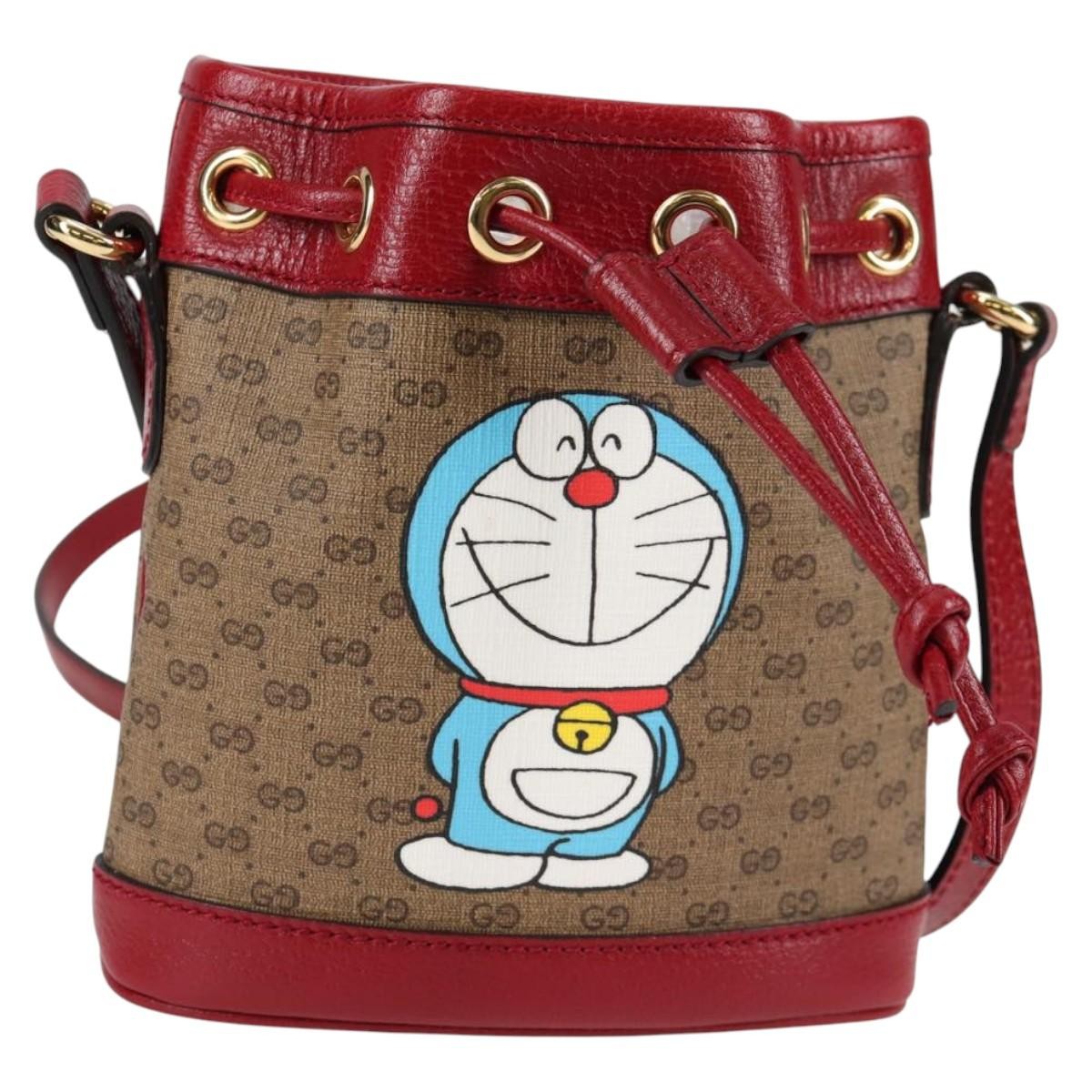 Gucci Doraemon Bucket Bag Printed Mini GG Coated Canvas, BEIGE, PVC, Crossbody bag