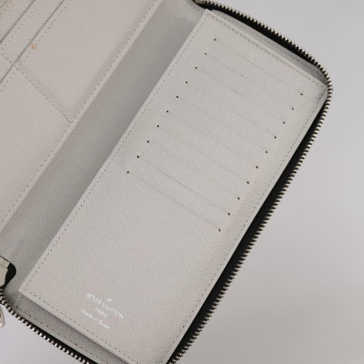 Louis Vuitton Zippy wallet vertical Taiga leather, WHITE, LEATHER, Wallets