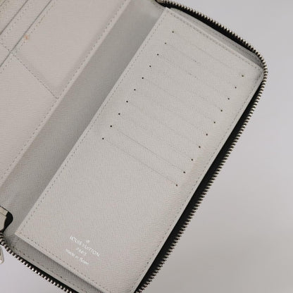 Louis Vuitton Zippy wallet vertical Taiga leather, WHITE, LEATHER, Wallets