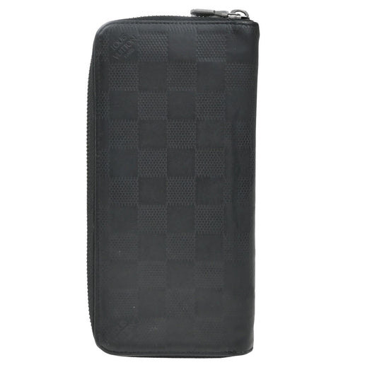 Louis Vuitton Zippy wallet vertical Damier Infini Leather, BLACK, LEATHER, Wallets