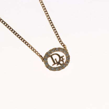 Christian Dior Vintage Logo Round Pendant Necklace Metal and Crystals, GOLD, METAL, Necklace