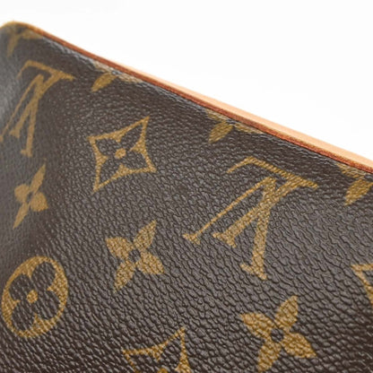 Louis Vuitton Trotteur Handbag Monogram Canvas, Brown, Canvas, Clutch