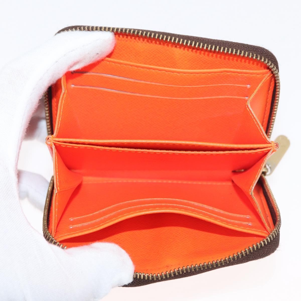 Louis Vuitton Porte-Monnaie Zippy Wallet monogramme empreinte, Orange, Canvas, Wallet