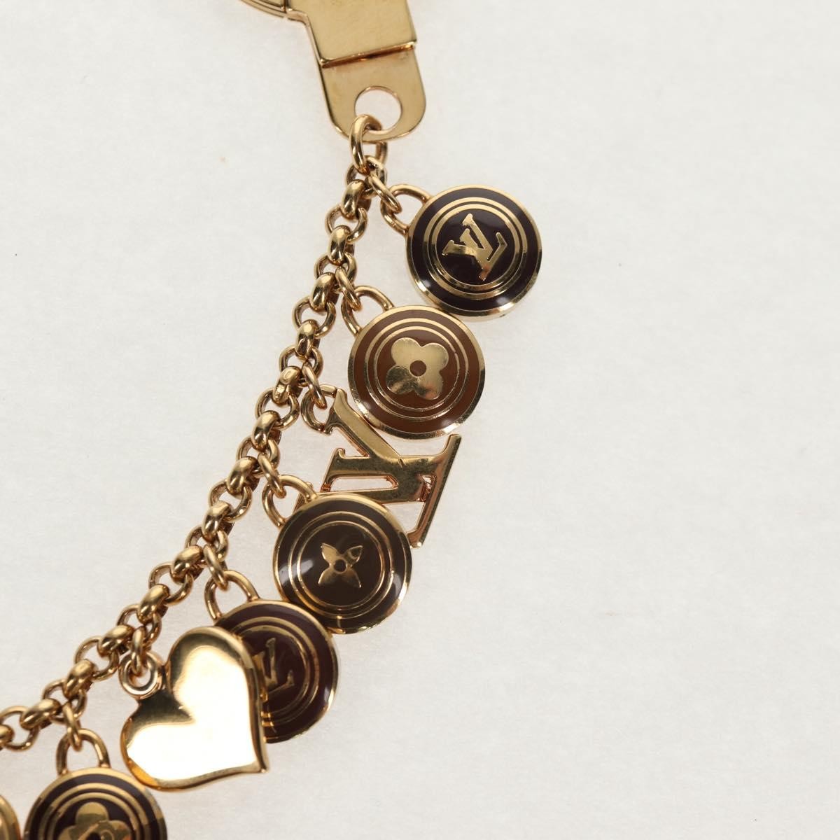 Louis Vuitton Pastilles Bag Charm and Key Holder Metal and Enamel, GOLD, METAL, Charms and Keychains
