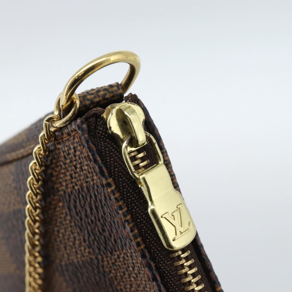Louis Vuitton Mini pochette accessoires Damier Canvas, Brown, Canvas, Clutch