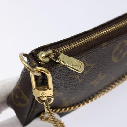Louis Vuitton Mini pochette accessoires Canvas, BROWN, CANVAS, Clutche & pouche