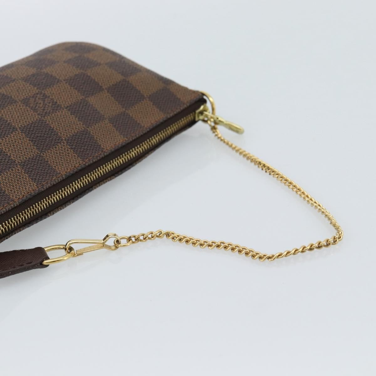 Louis Vuitton Mini pochette accessoires Damier Canvas, Brown, Canvas, Clutch