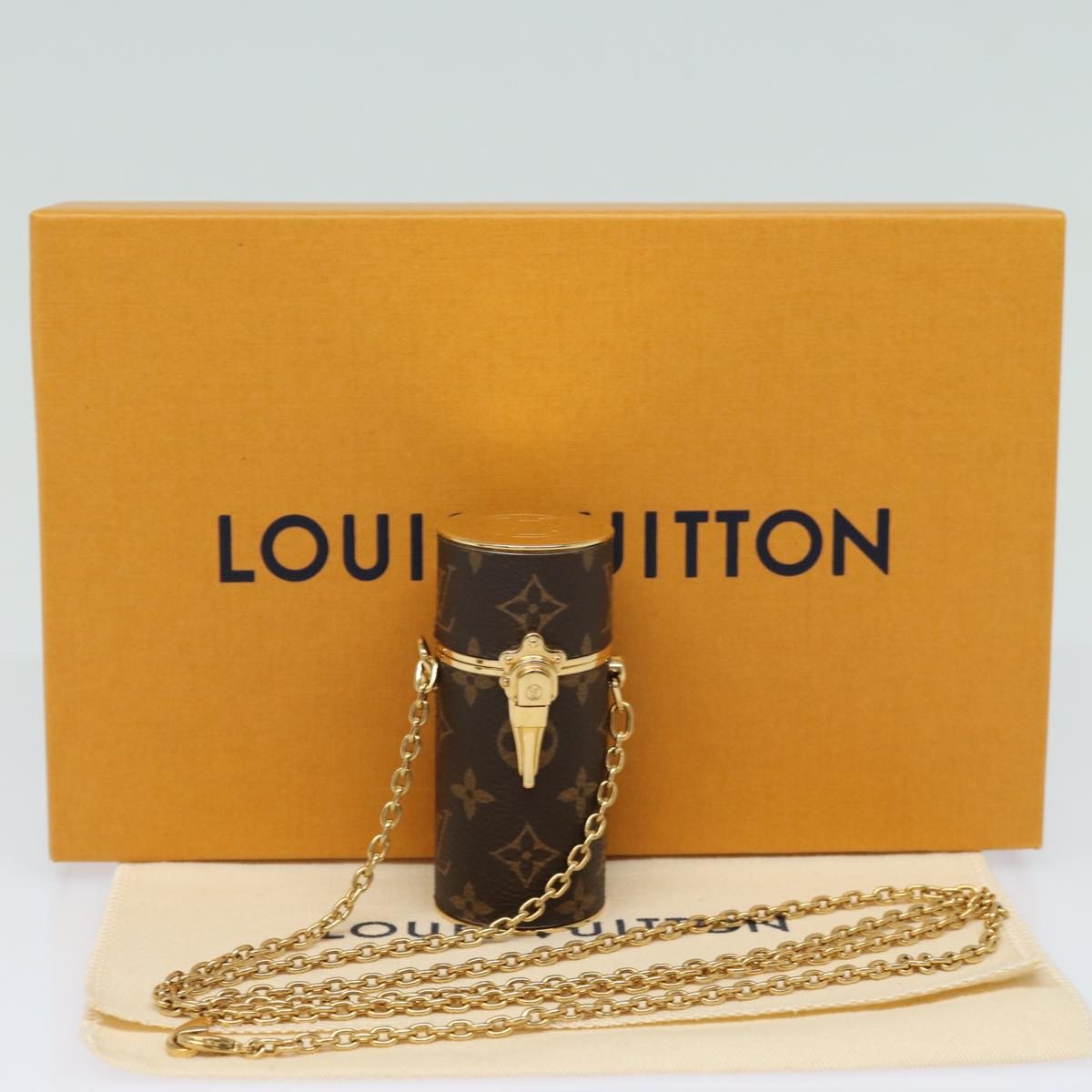 Louis Vuitton Lipstick Case on Chain Monogram Canvas, BROWN, CANVAS, Clutche & pouche