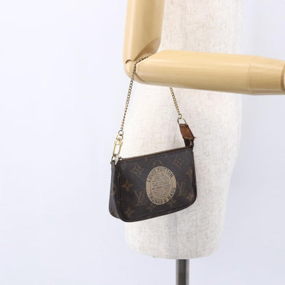 Louis Vuitton Pochette Accessoires Limited Edition Monogram Canvas, BROWN, CANVAS, Clutche & pouche
