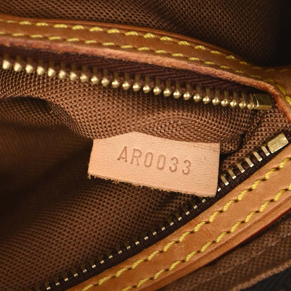 Louis Vuitton Trotteur Handbag Monogram Canvas, Brown, Canvas, Clutch