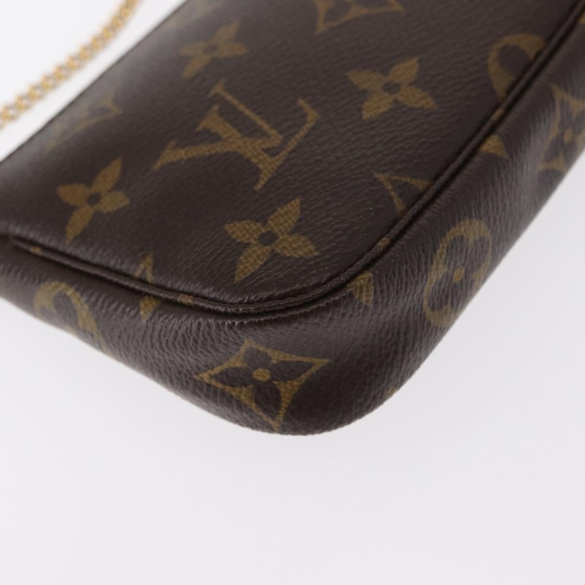 Louis Vuitton Mini pochette accessoires Canvas, BROWN, CANVAS, Clutche & pouche