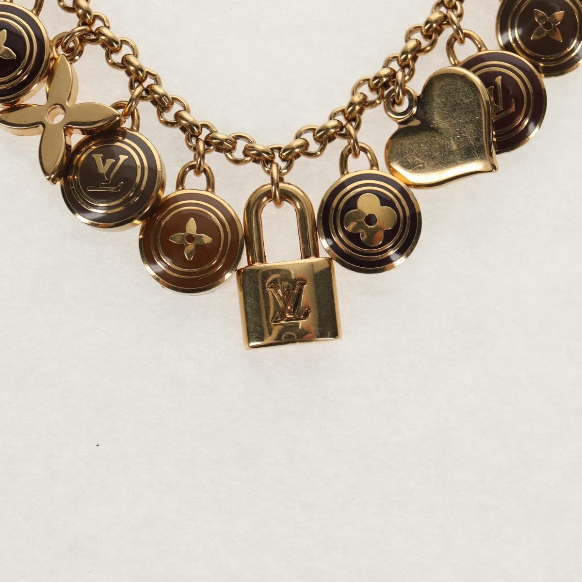 Louis Vuitton Pastilles Bag Charm and Key Holder Metal and Enamel, GOLD, METAL, Charms and Keychains