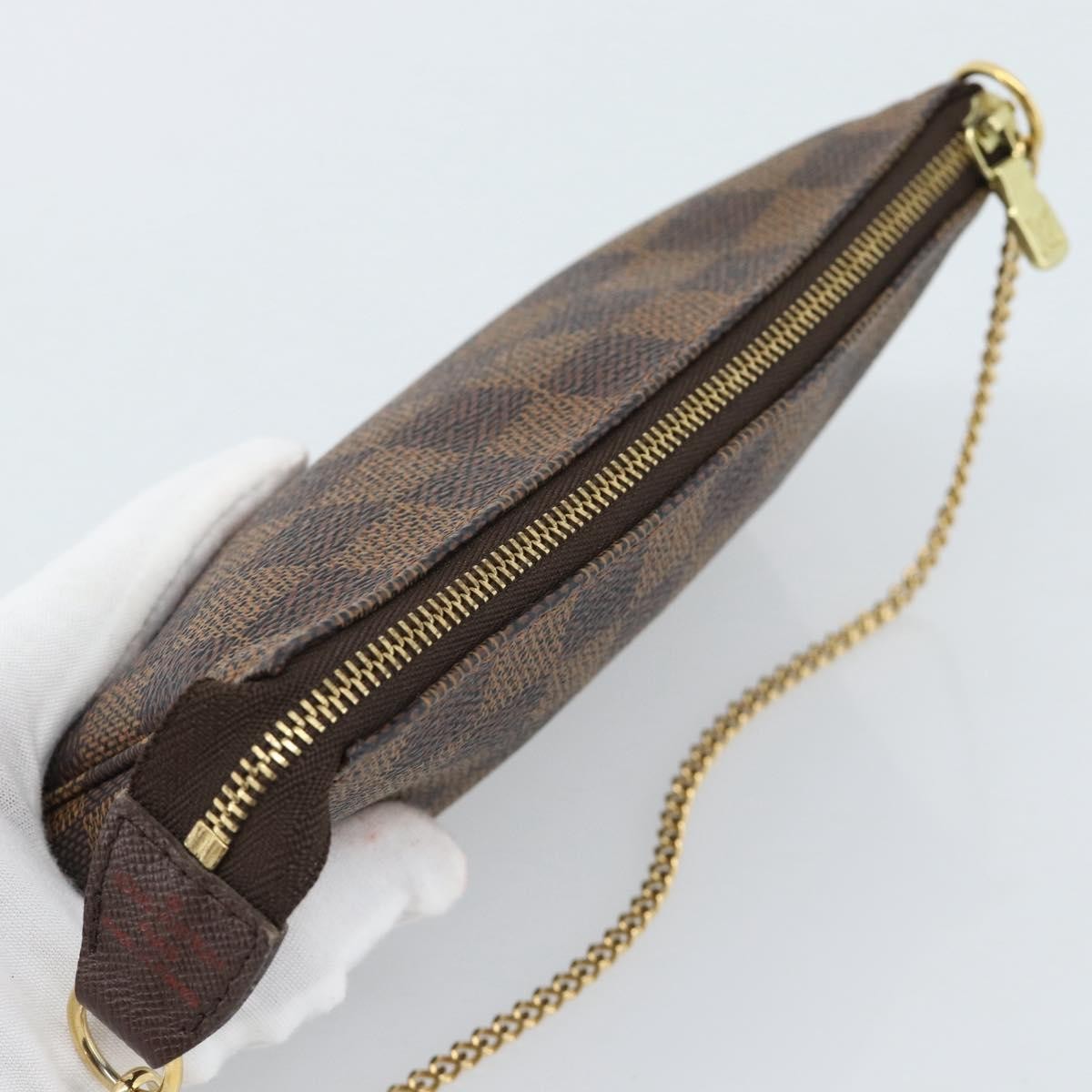 Louis Vuitton Mini pochette accessoires Damier Canvas, Brown, Canvas, Clutch
