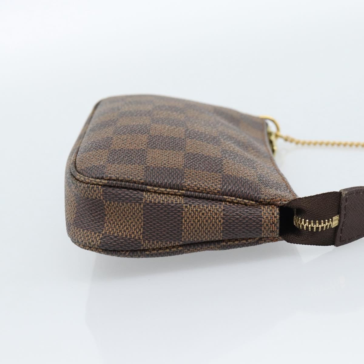 Louis Vuitton Mini pochette accessoires Damier Canvas, Brown, Canvas, Clutch