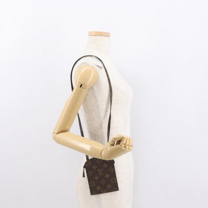 Louis Vuitton Pochette Secret Monogram canvas, BROWN, CANVAS, Clutche & pouche