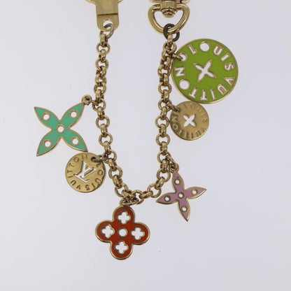 Louis Vuitton Porto Cles Looping Bag Charm and Key Holder Metal and Enamel, GOLD, METAL, Charms and Keychains