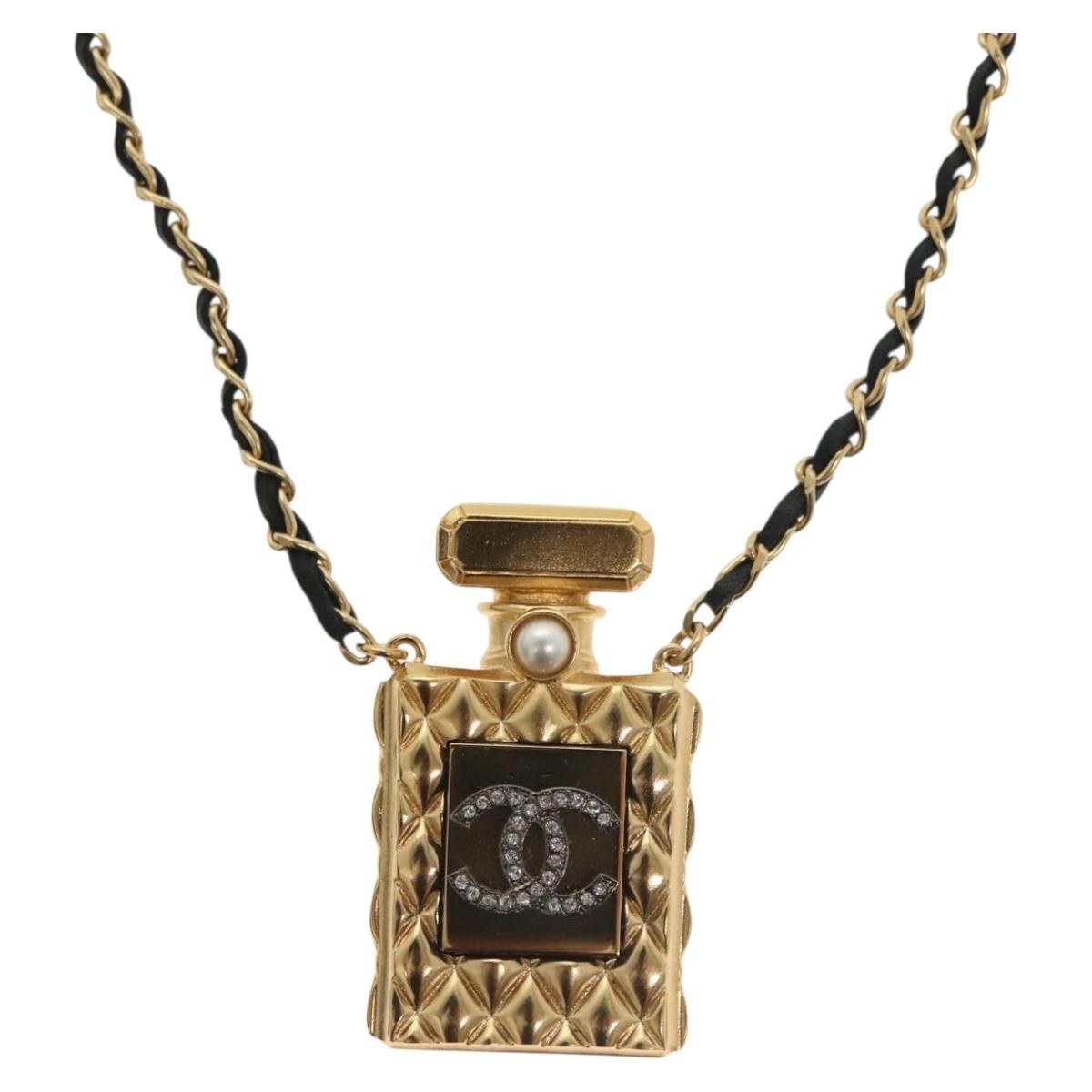 "Chanel CC Perfume Bottle Pendant Chain Long Necklace Metal with Leather, Crystals and Faux Pearl", GOLD, METAL, Necklace