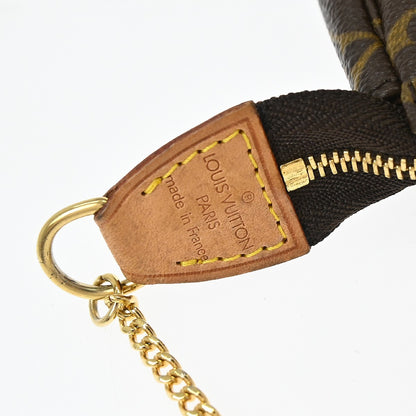 Louis Vuitton Mini pochette accessoires Canvas, Brown, Canvas, Clutch